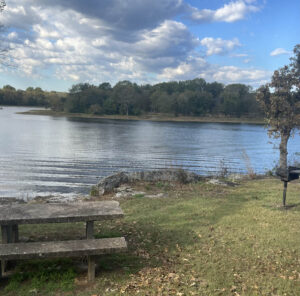 Picnic table at a lake in Oklahoma on a summer day